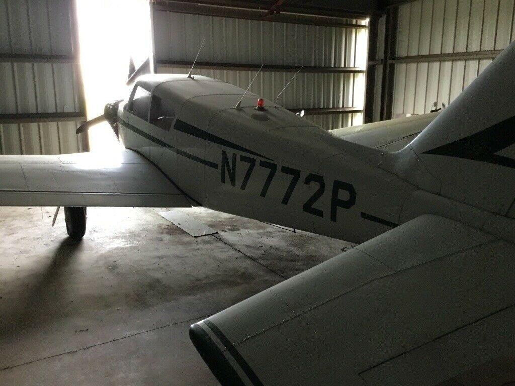 hangared 1961 Piper Comanche 180 aircraft